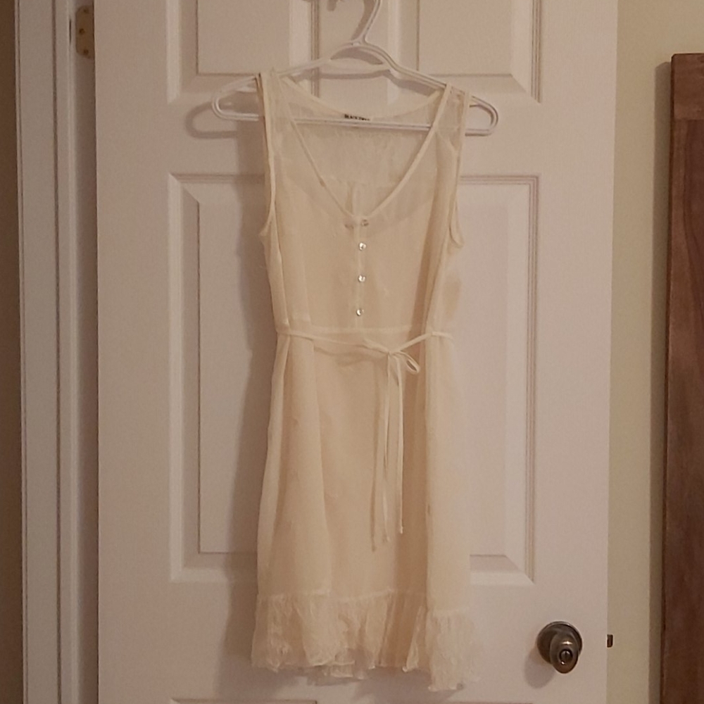 Cream dress with lace and embroidered detailing